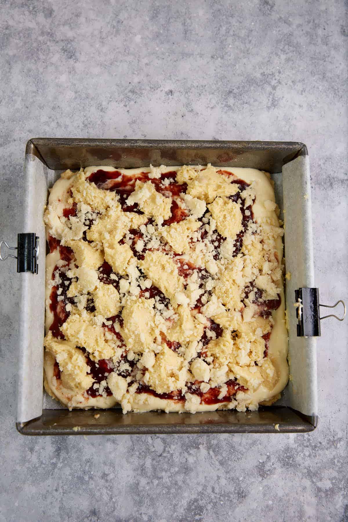 Crumble on top of the cake batter.