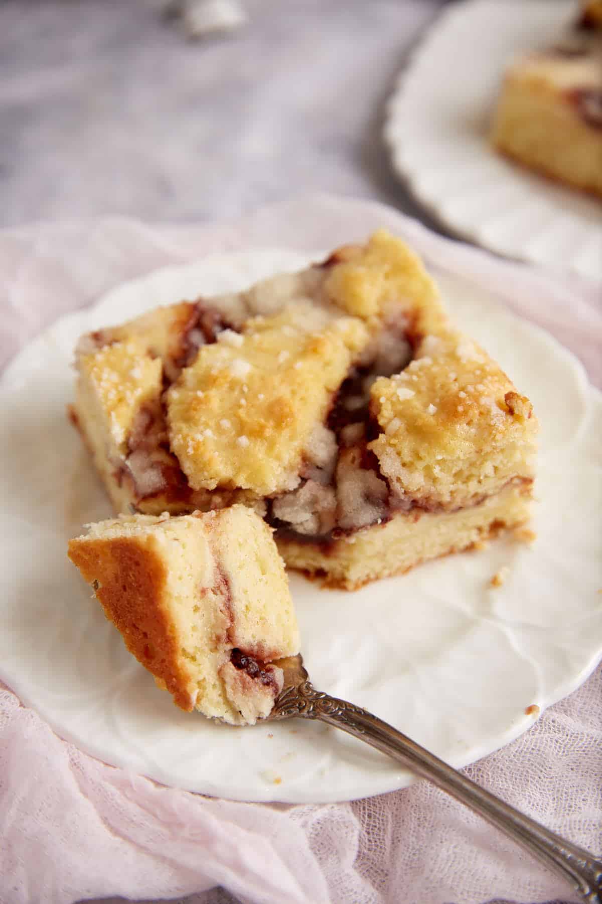 A bite of strawberry coffee cake.
