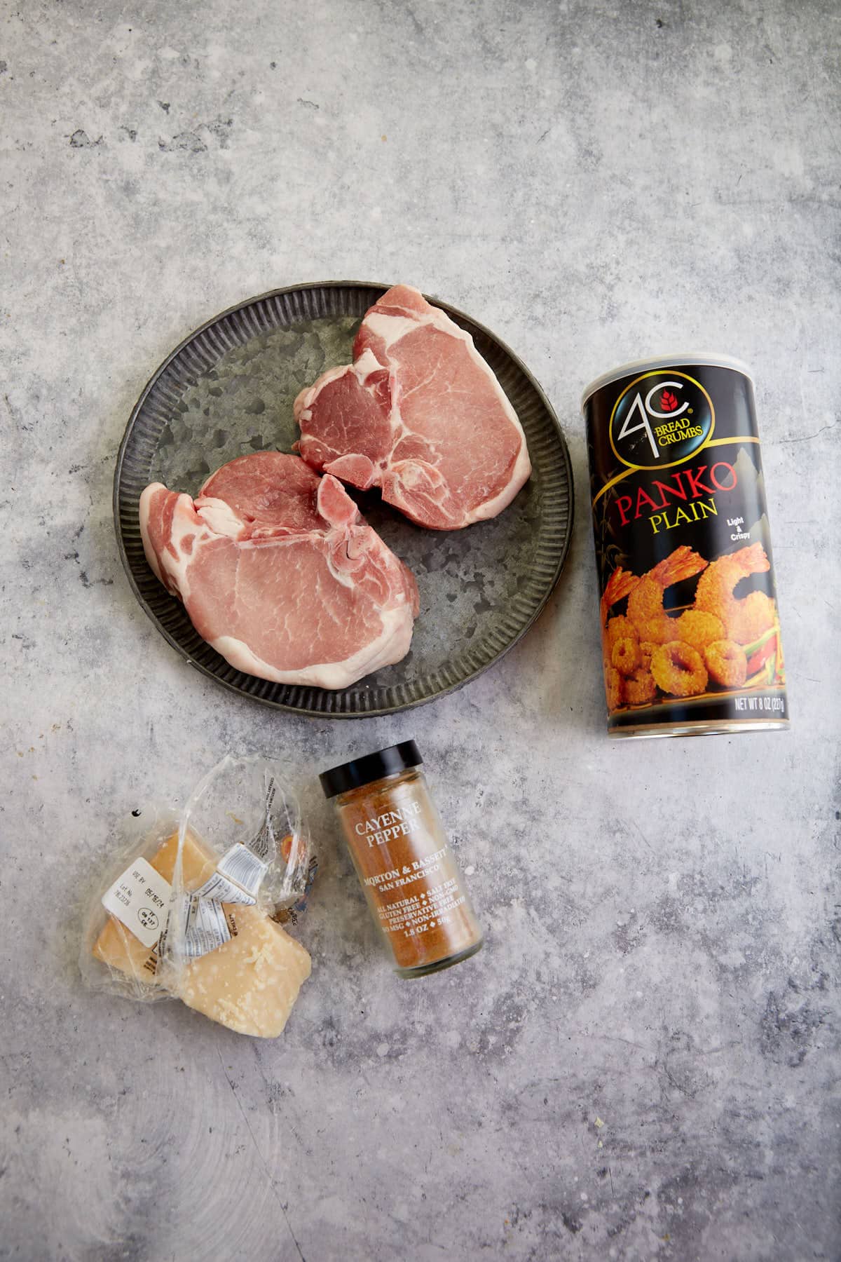 The ingredients for breaded pork chops.