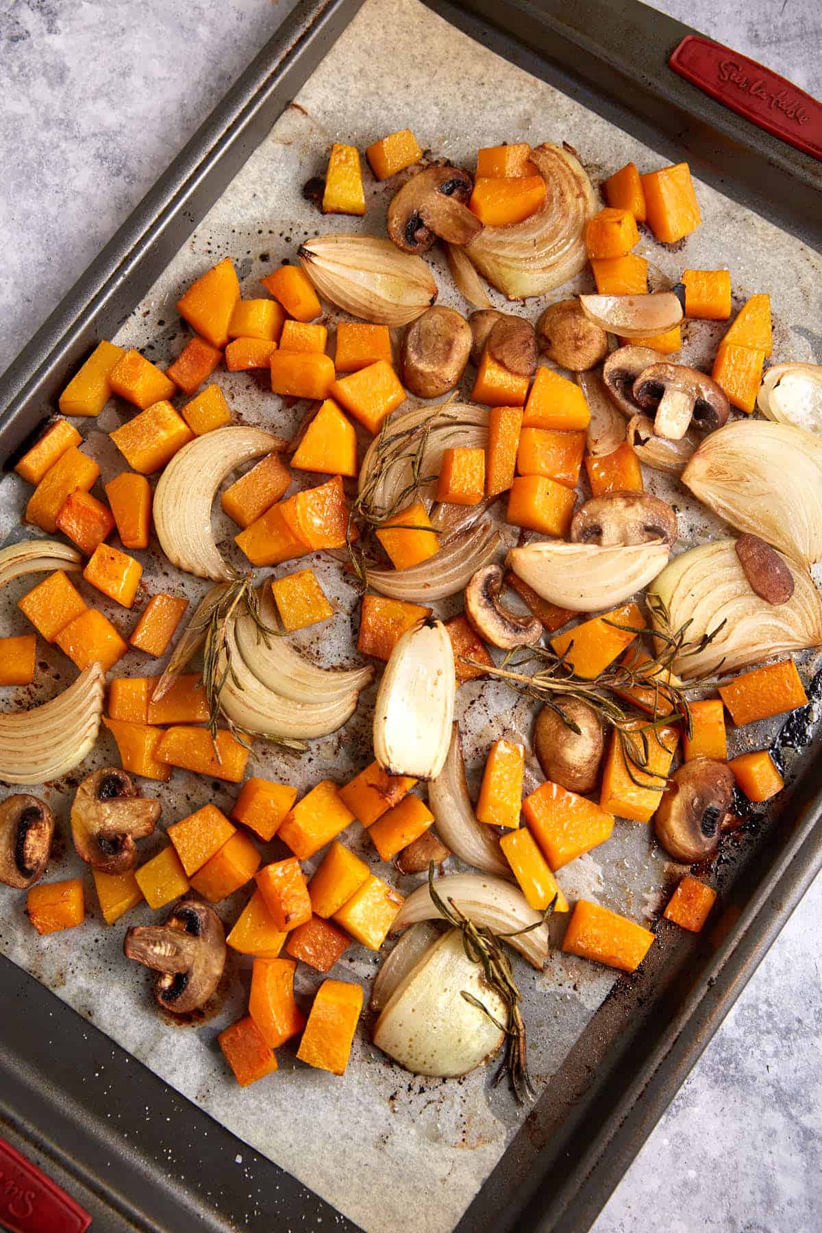 Roasted butternut squash with onions and mushrooms.