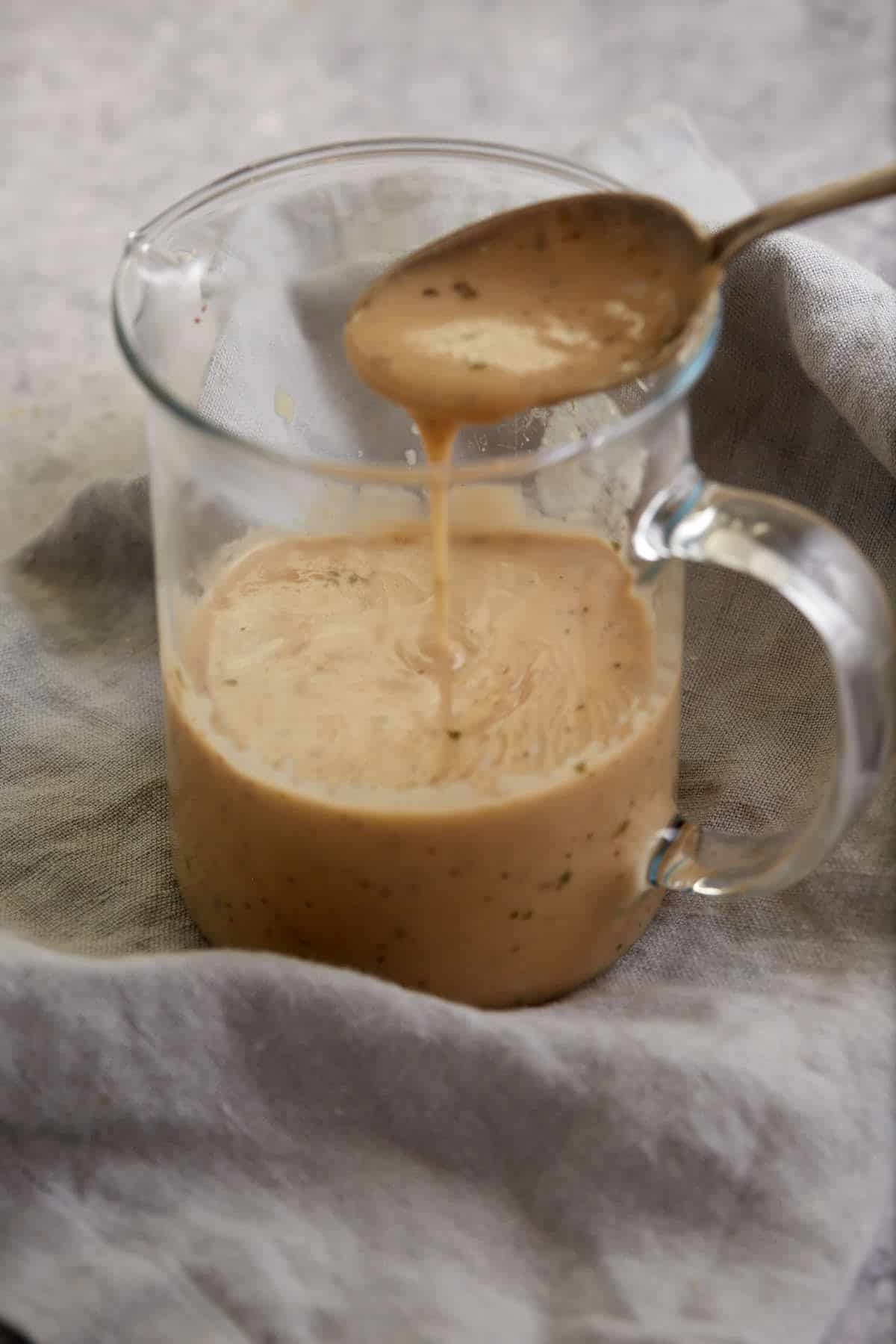 A spoon full of cream of chicken soup.