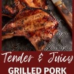 Grilled pork chops next to a knife on a platter.