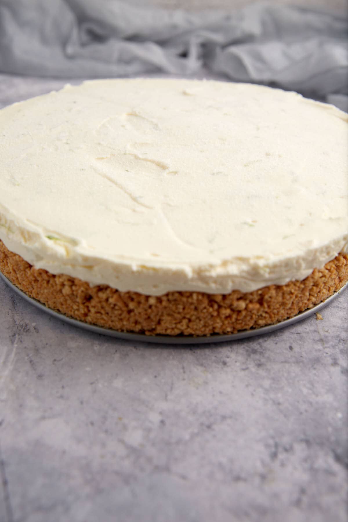 A key lime pie with the springform pan removed.