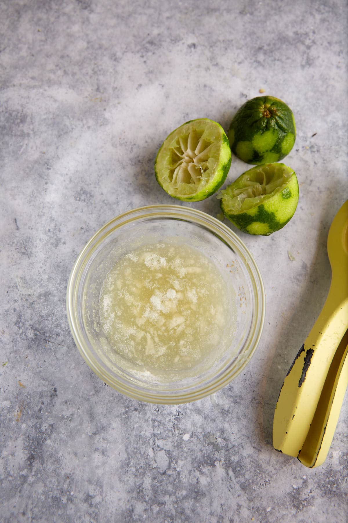 Gelatin in a bowl of lime juice.