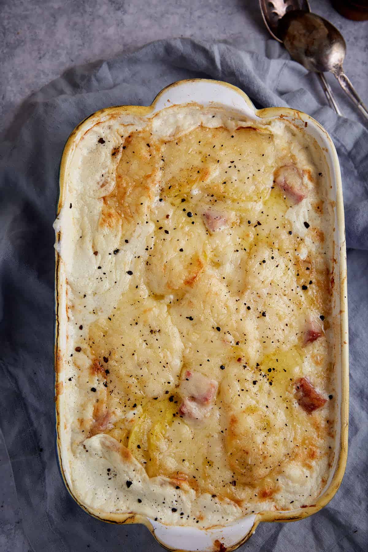 A baked potato and ham casserole.