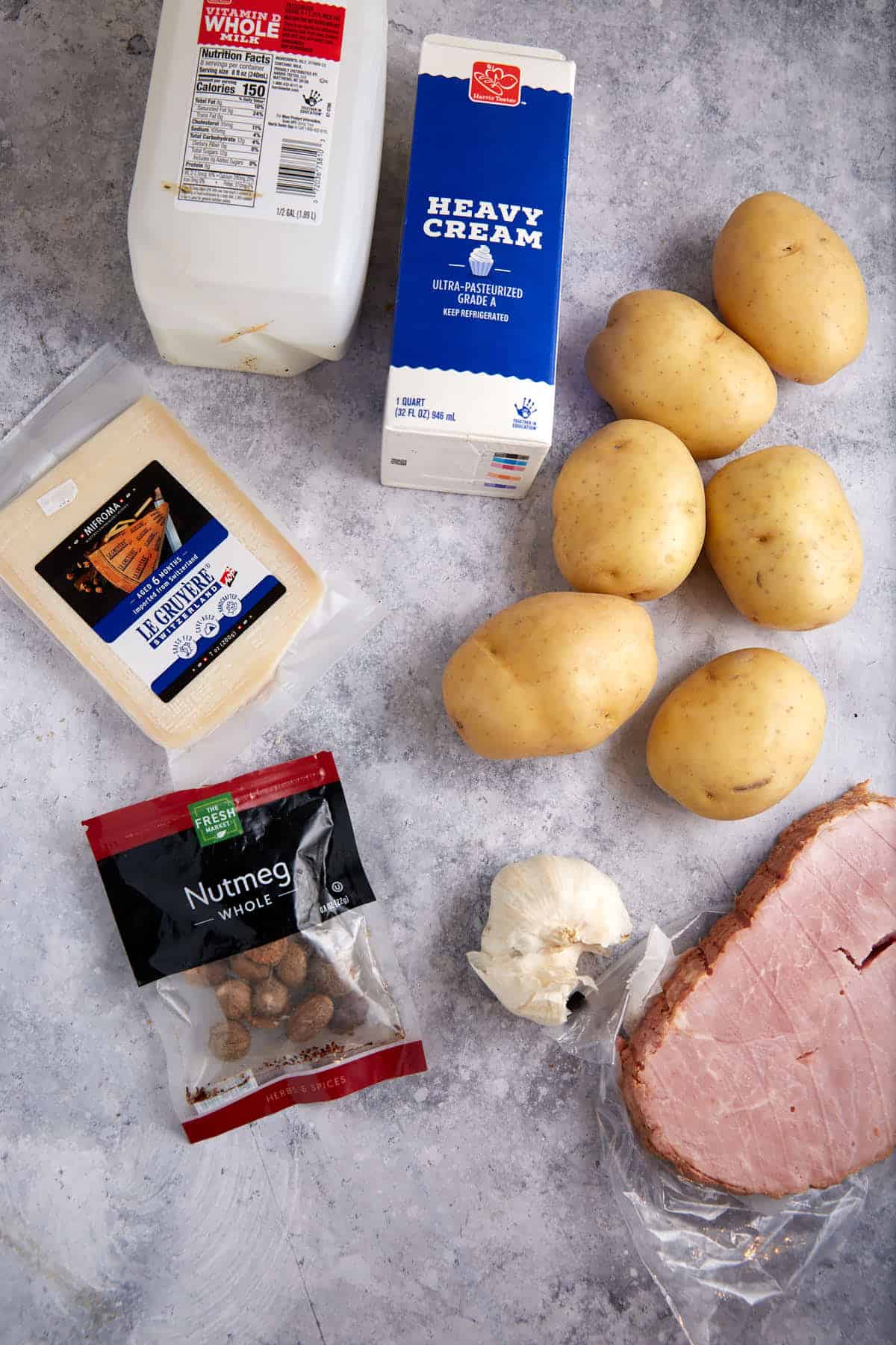 The ingredients for scalloped potatoes and ham.