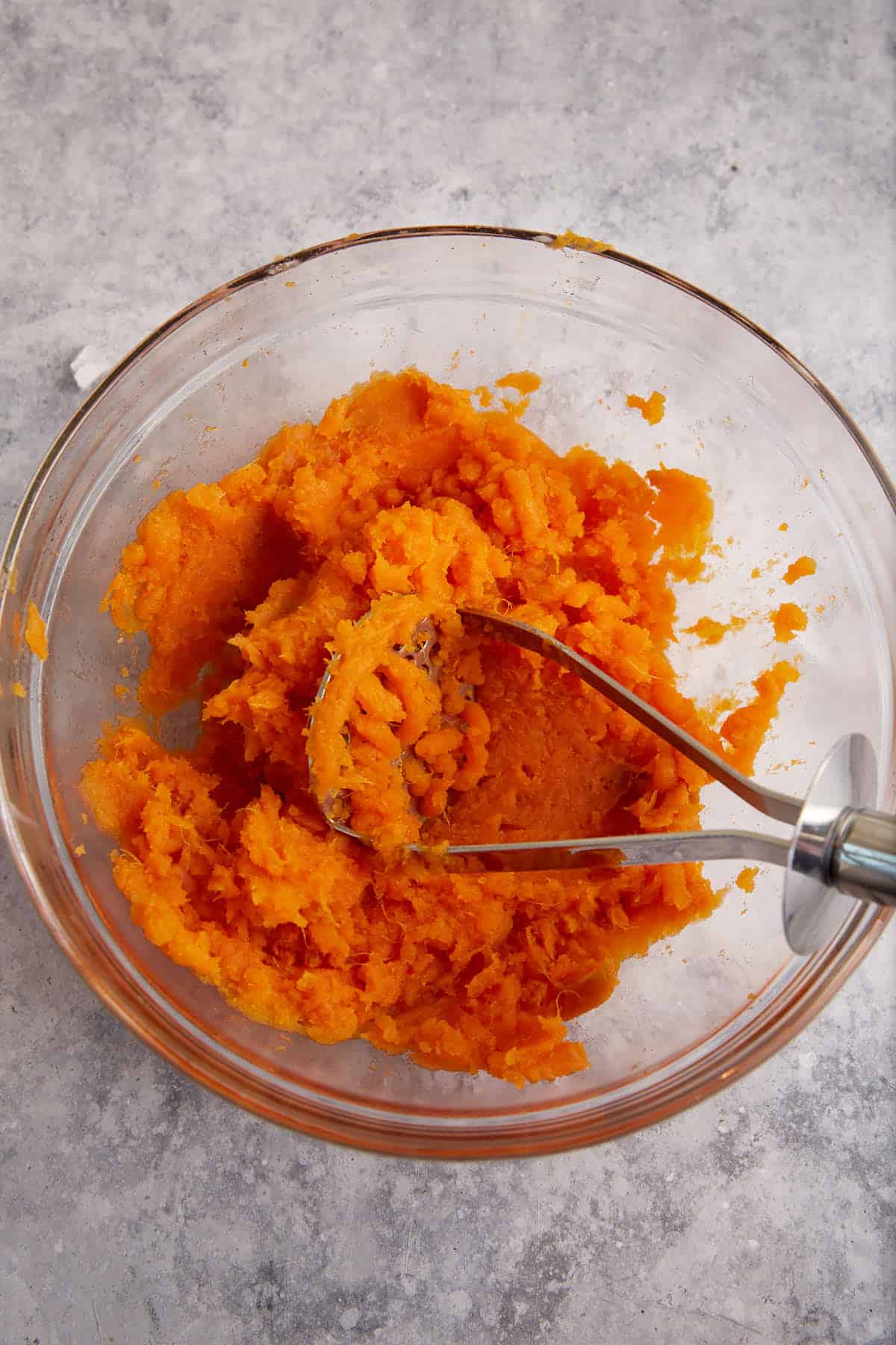 A bowl of mashed sweet potatoes.