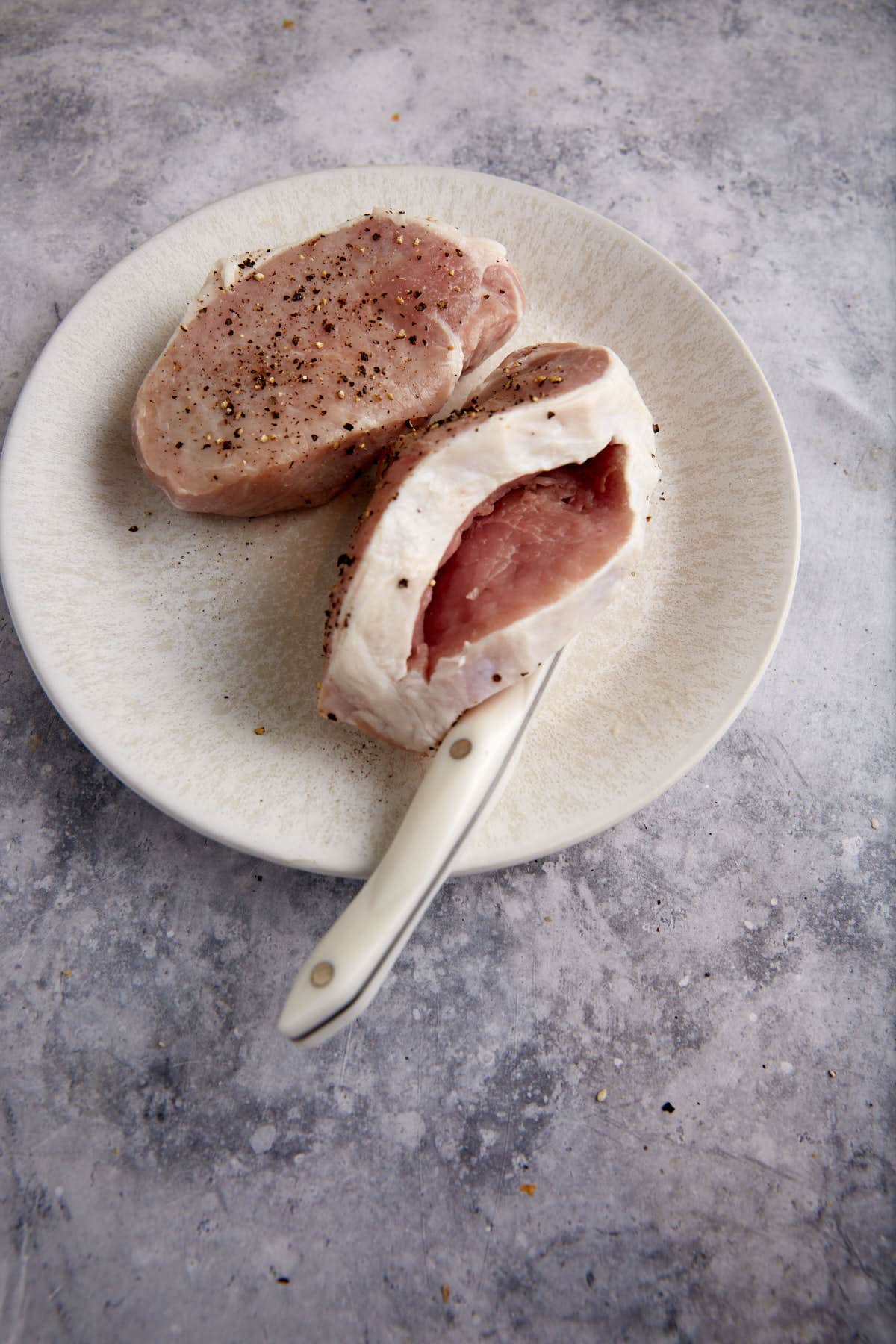 A slit cut into a pork chop.