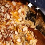 Baked wild rice and chicken casserole in a skillet.