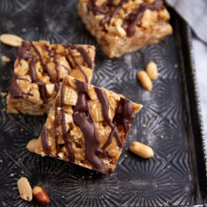 Chex cereal bars on a black platter.