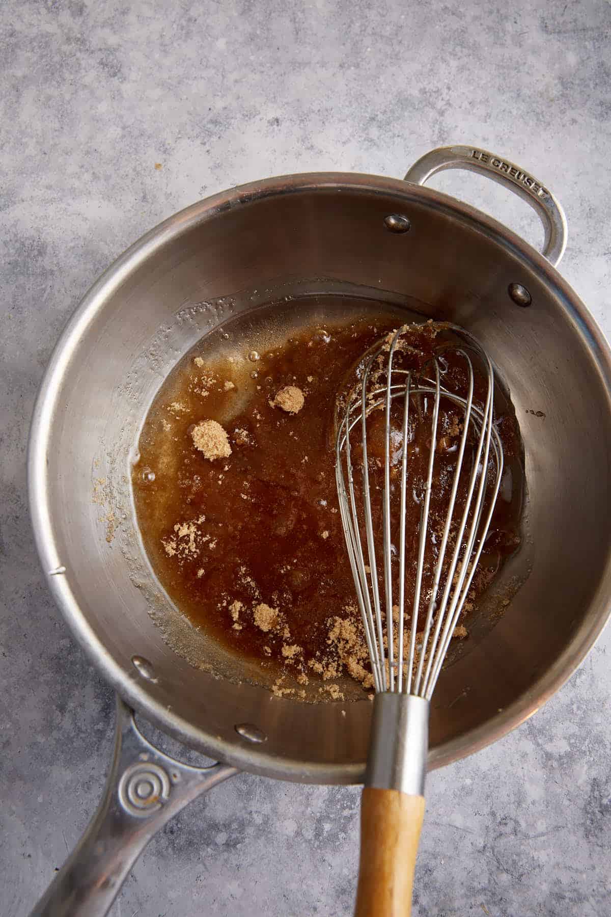 Brown sugar and corn syrup in a saucepan.