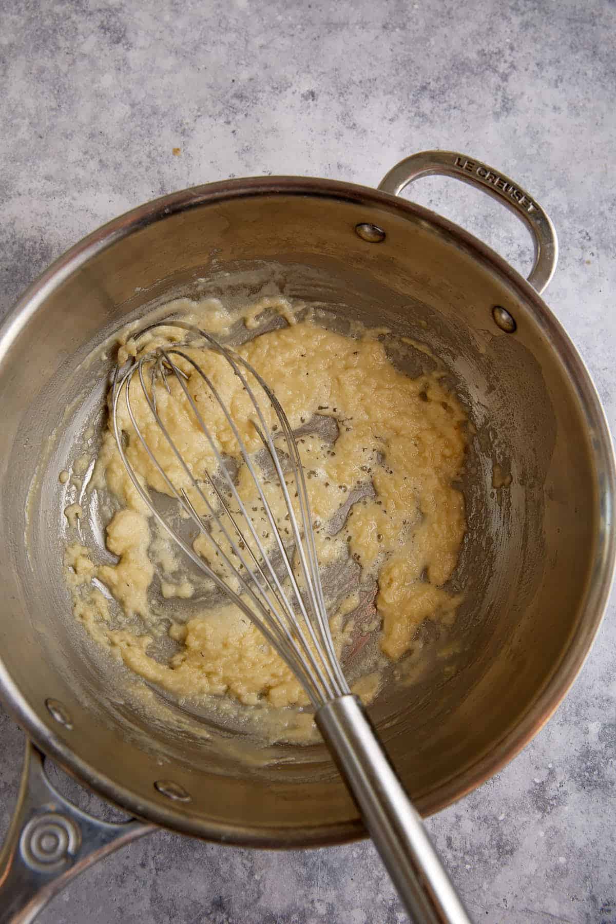 Butter and flour combined in a saucepan.