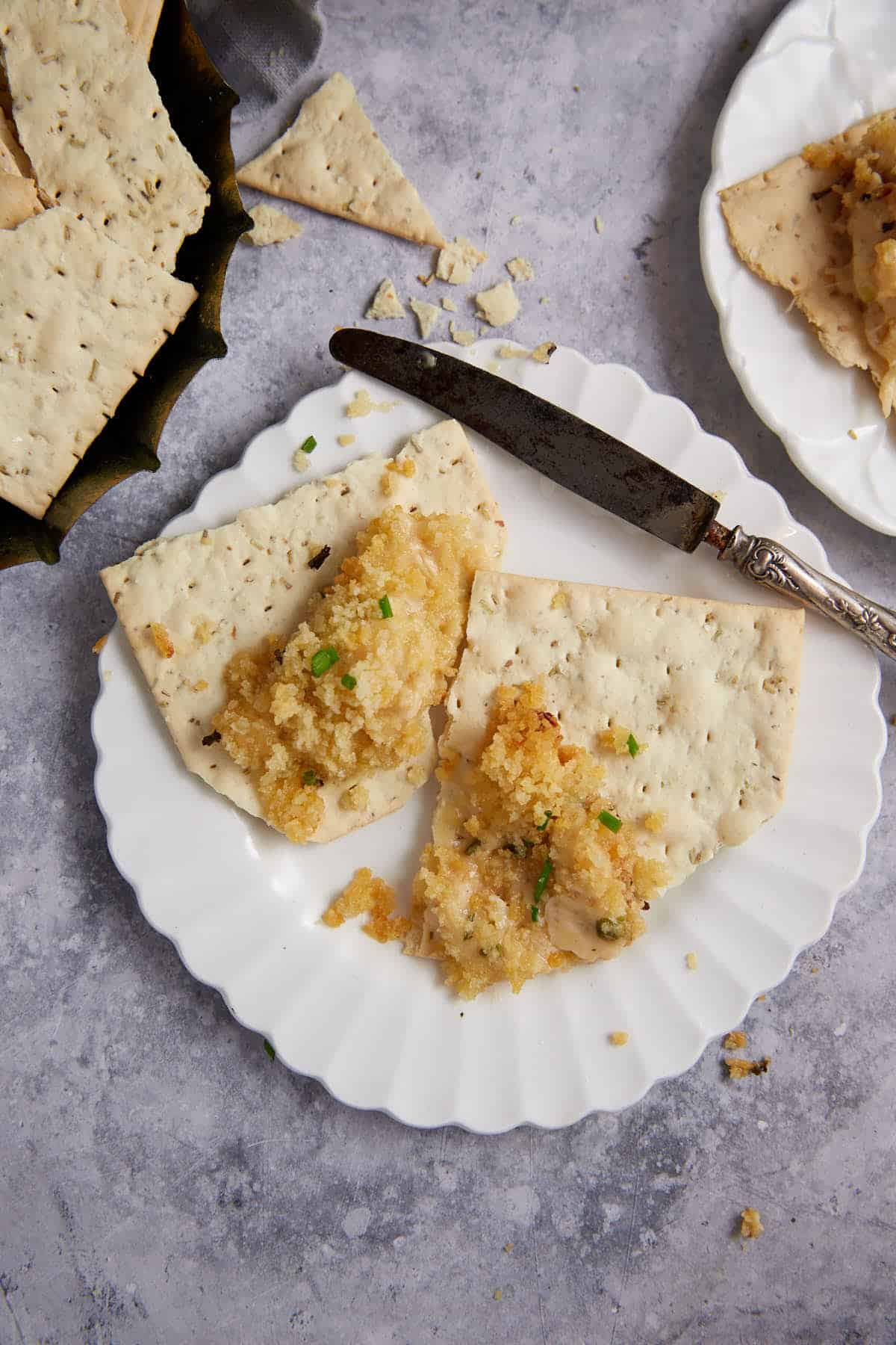 Crab dip spread on crackers.