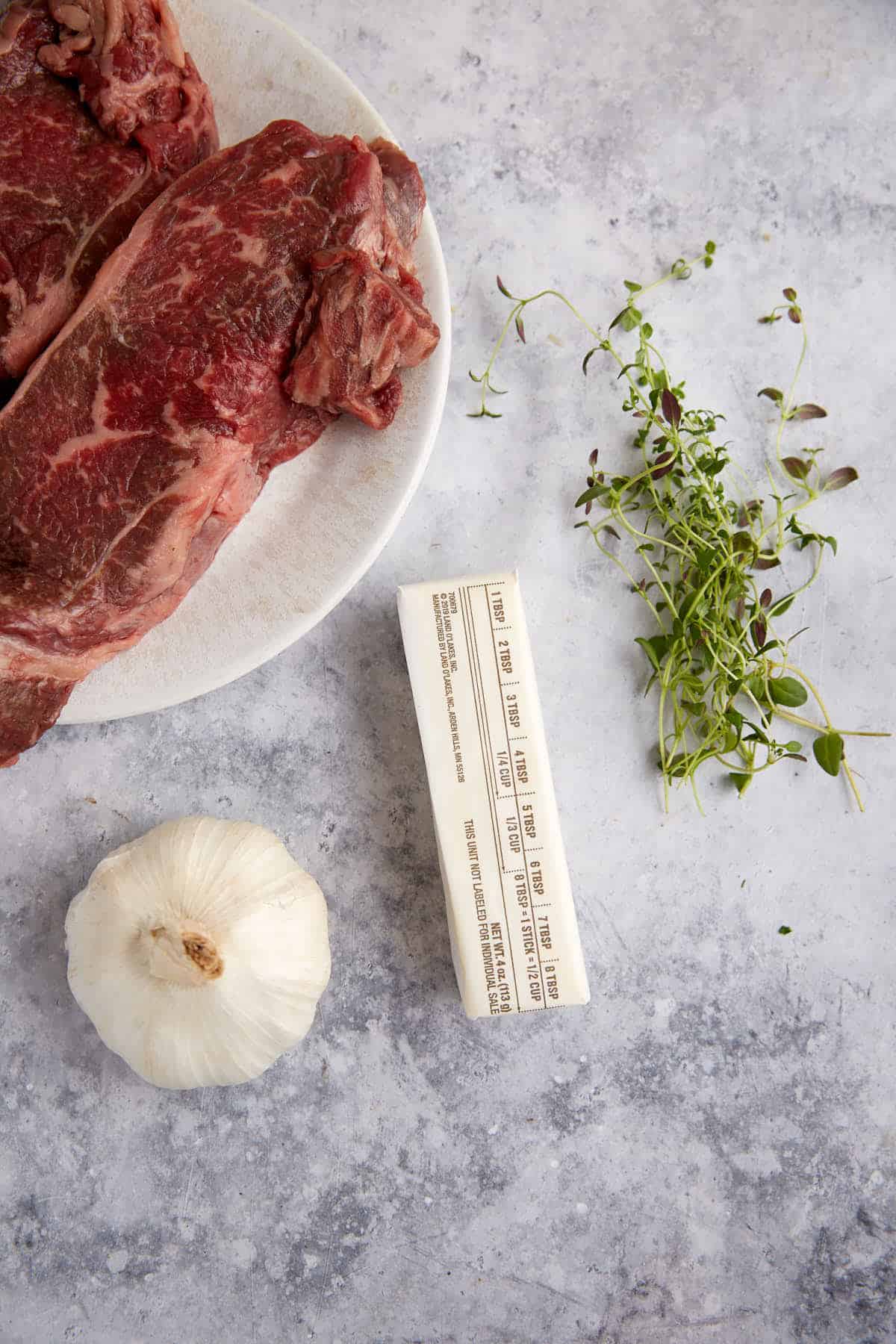 Ingredients for buttery garlic steak.