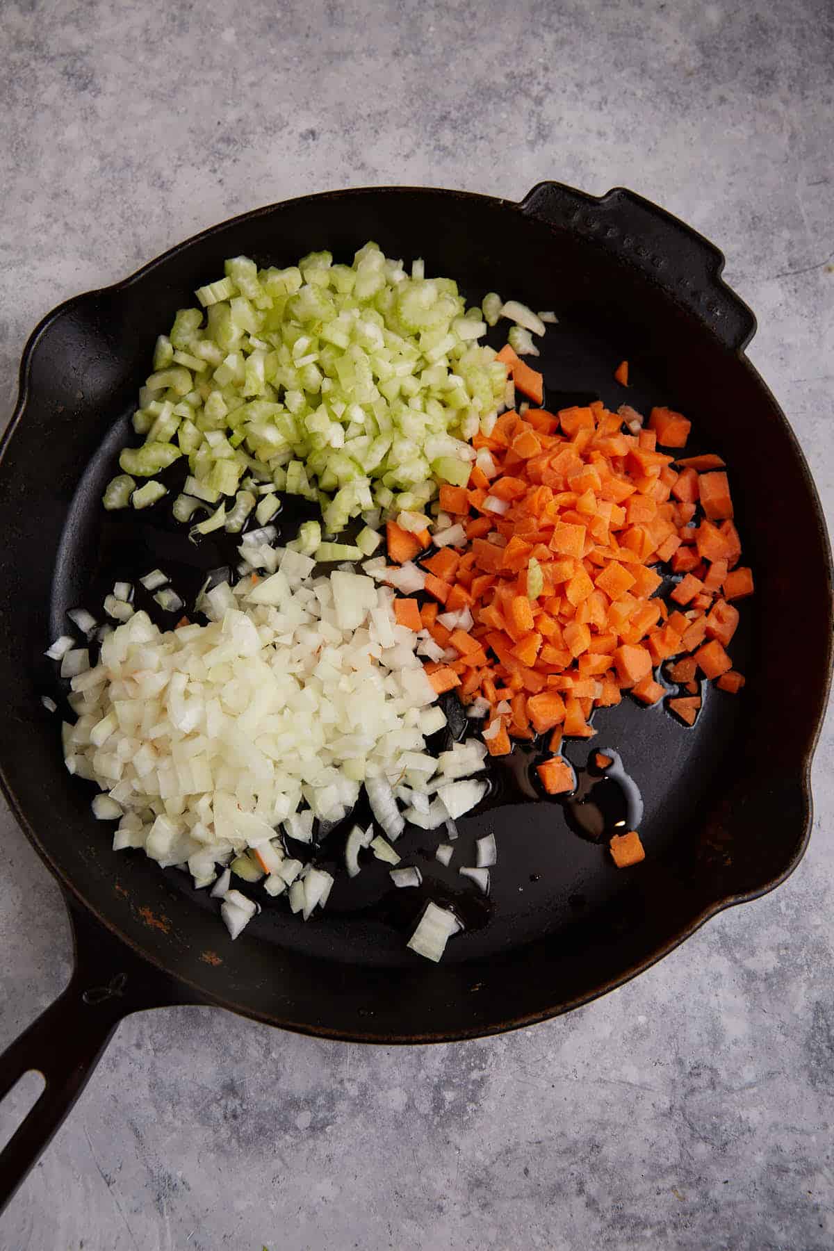 Carrots, onion and celery in a skillet.