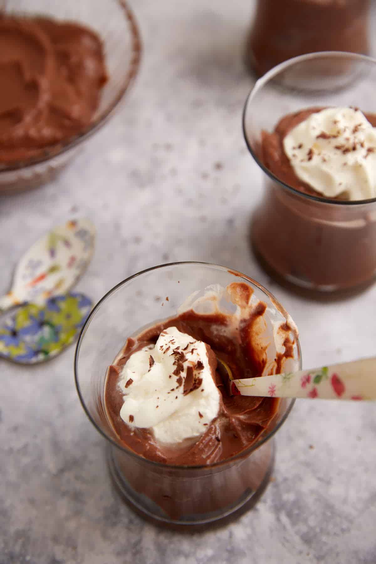 A spoon full of chocolate pudding.
