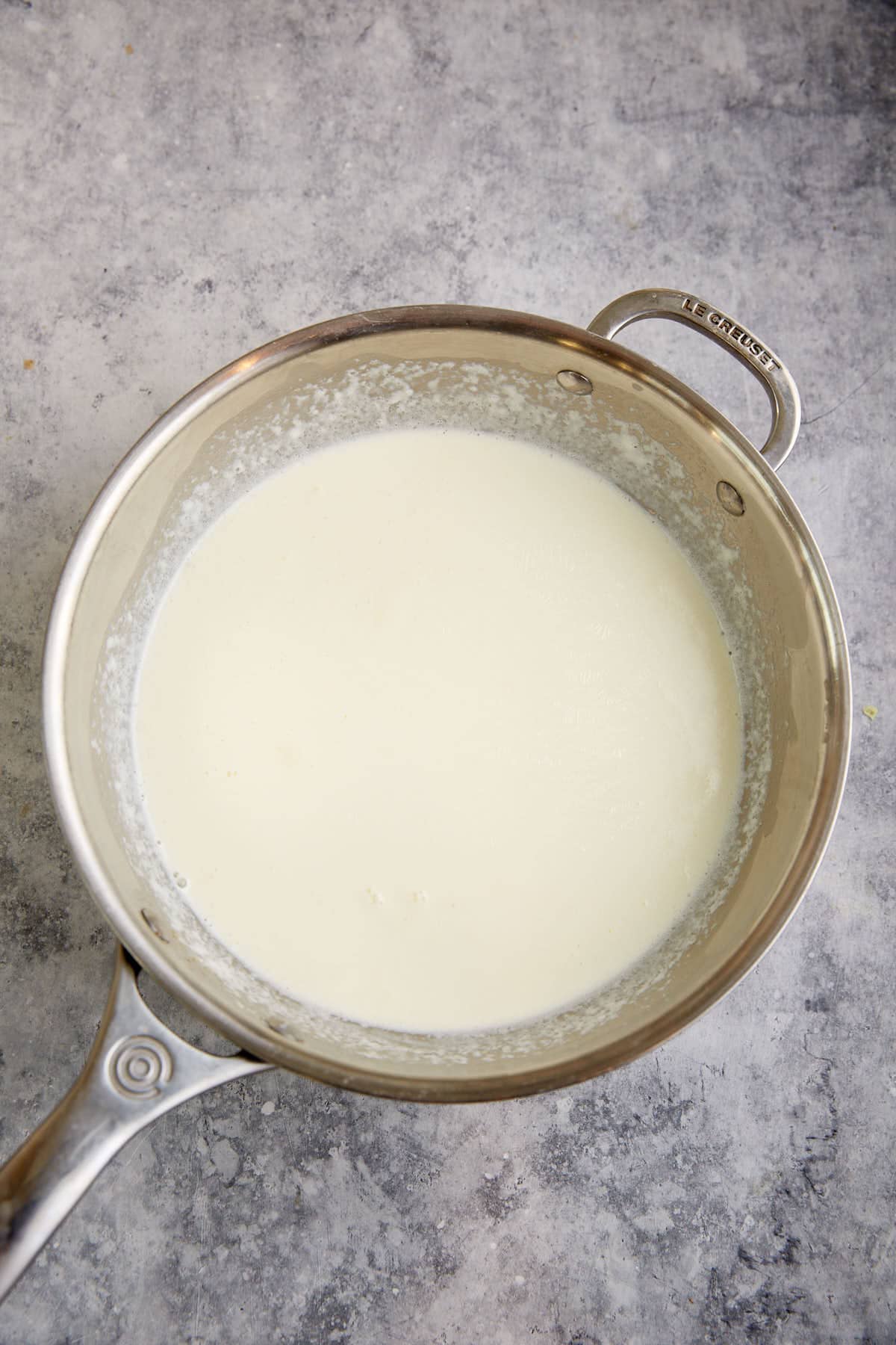 Cream cooked in a saucepan.