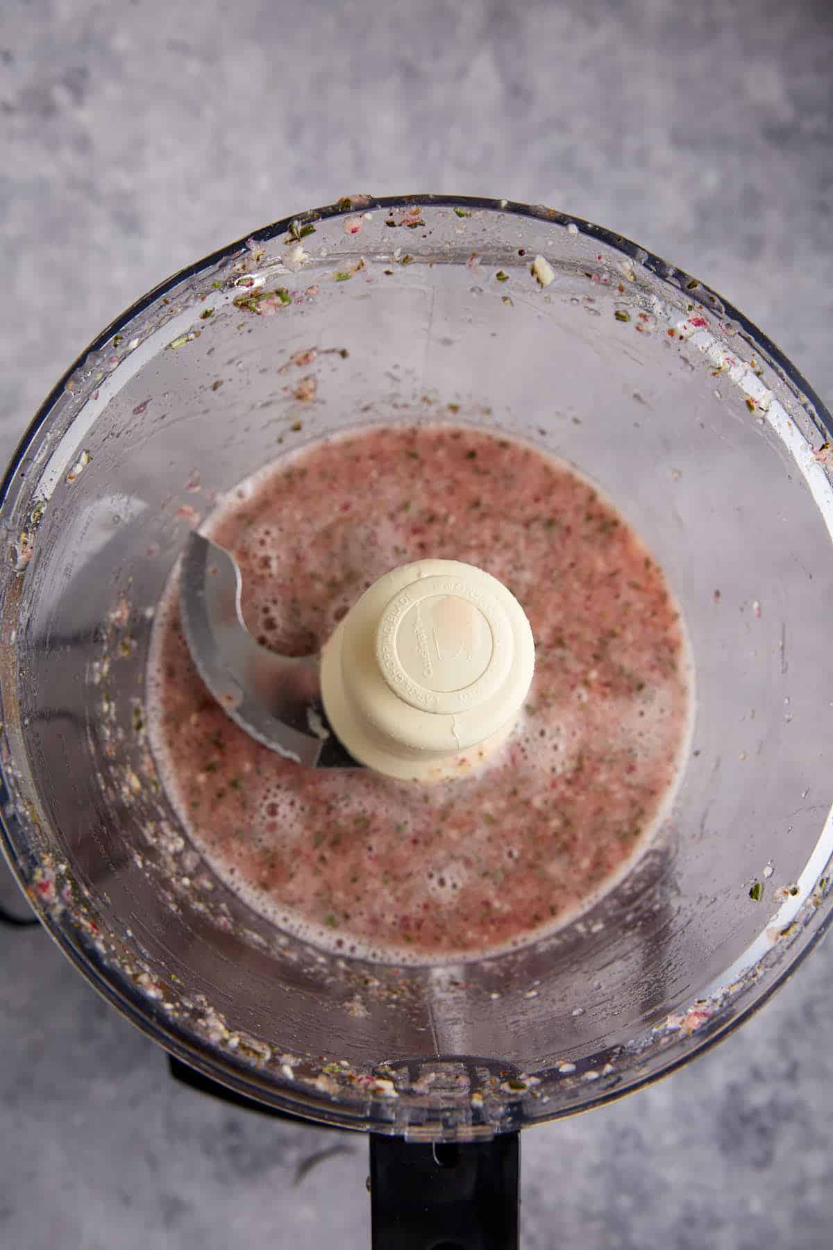 Salad dressing in a food processor.