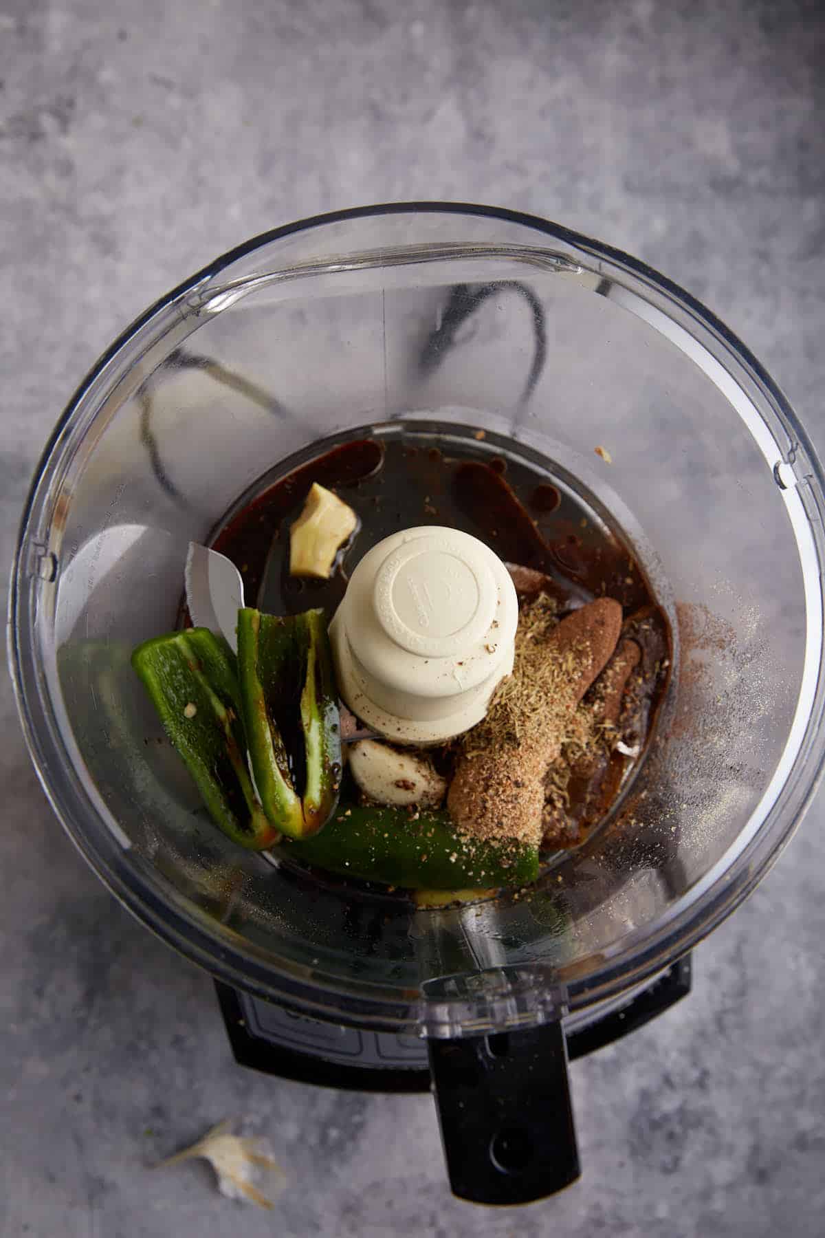 A food processor with the marinade.