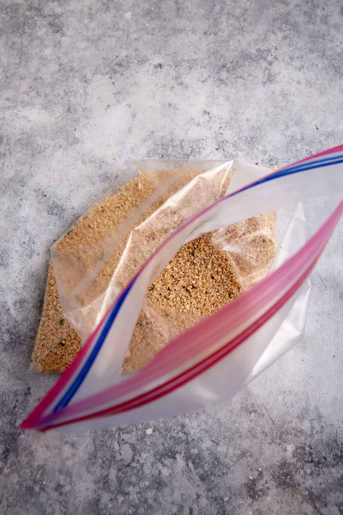 A ziplock of seasoning for shake n bake pork chops.