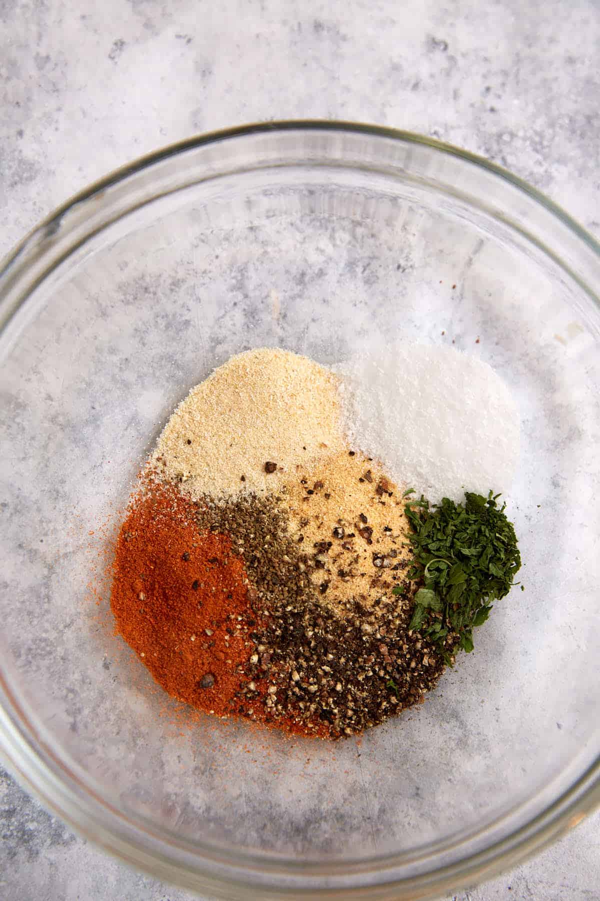 The ingredients for the seasoning for baked pork chops.