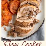 Slow cooker pork tenderloin sliced next to sweet potatoes.