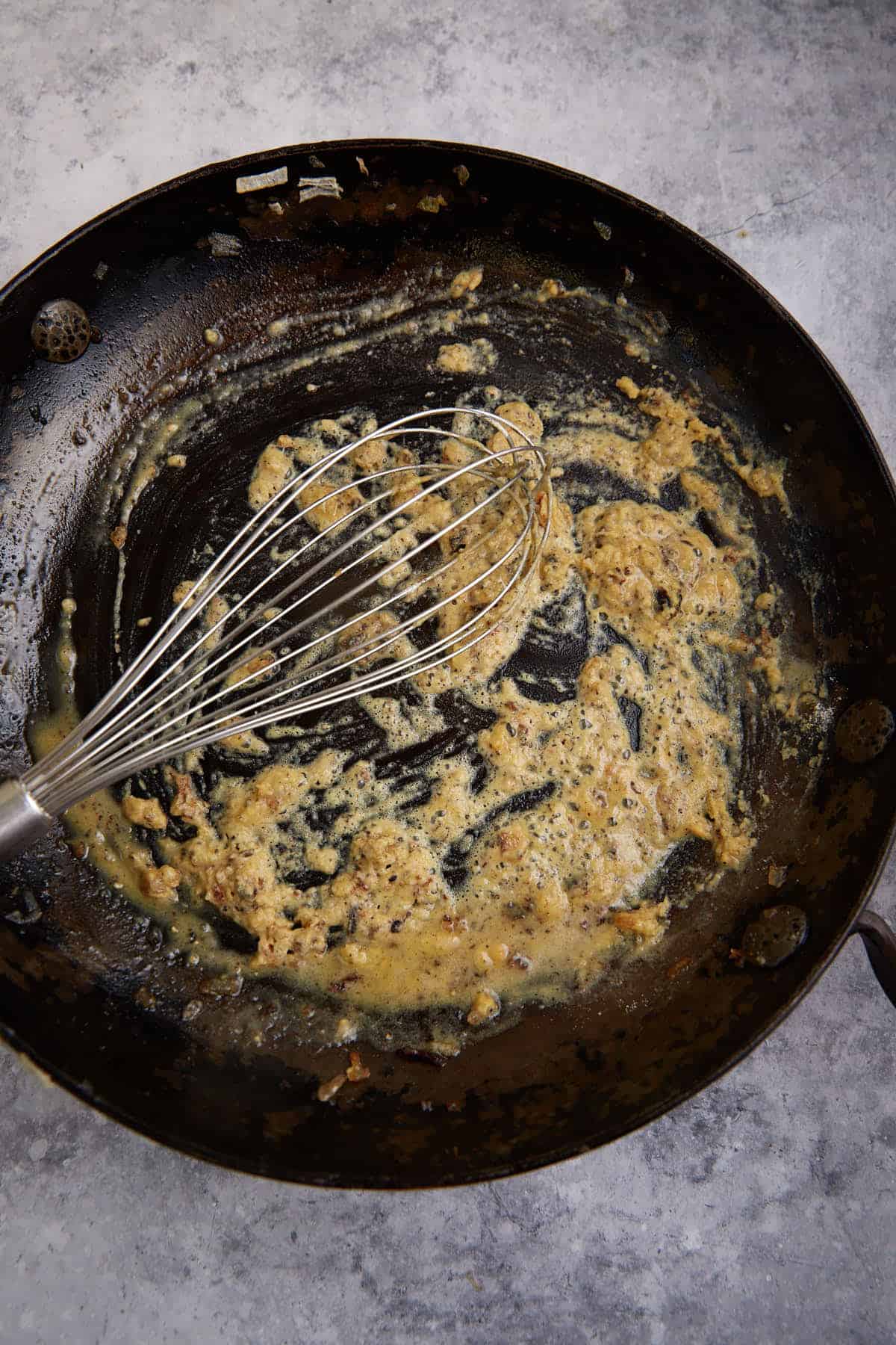 Flour and butter combined in a skillet.