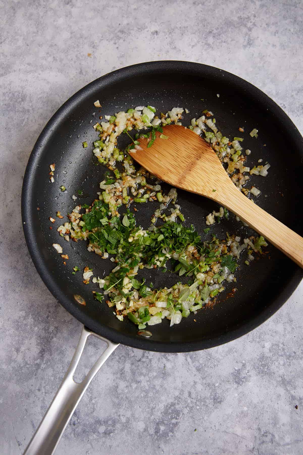 Celery and onion in a skillet.