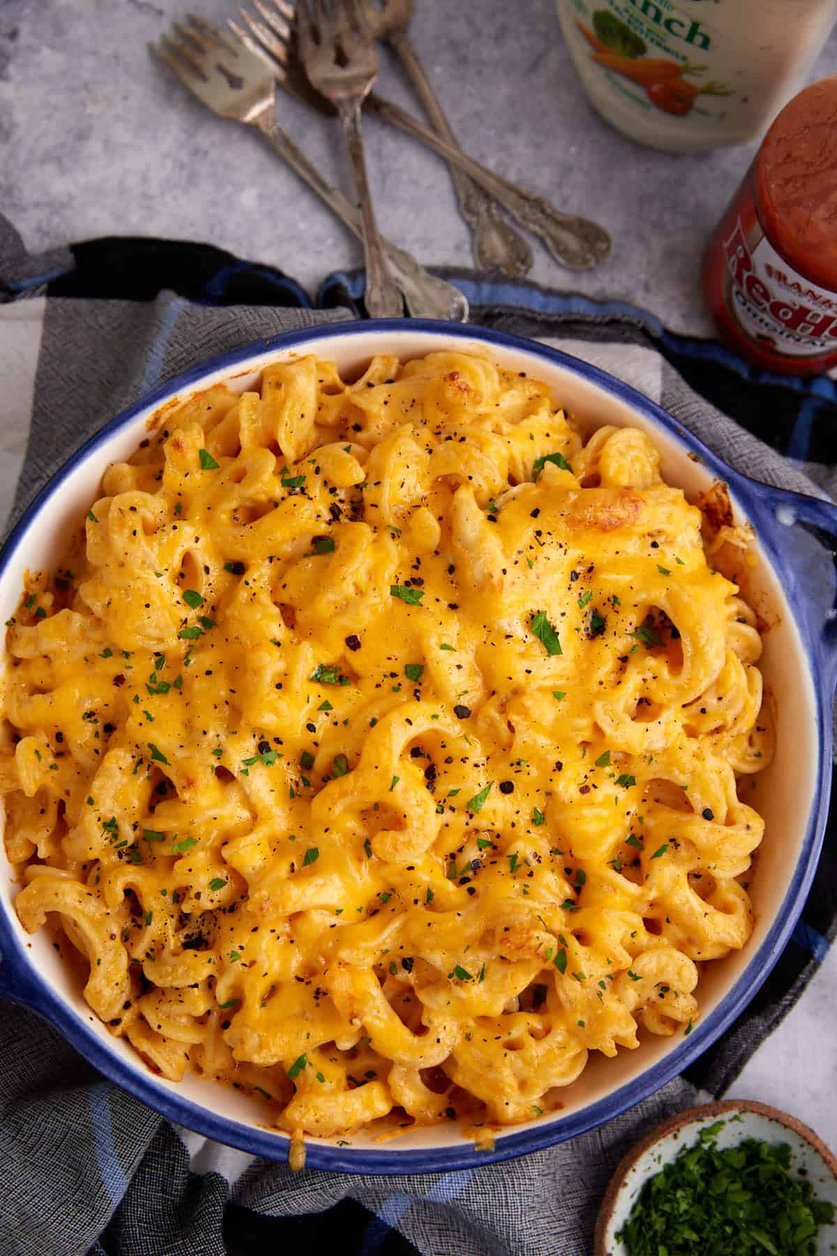A baked mac and cheese with buffalo sauce.