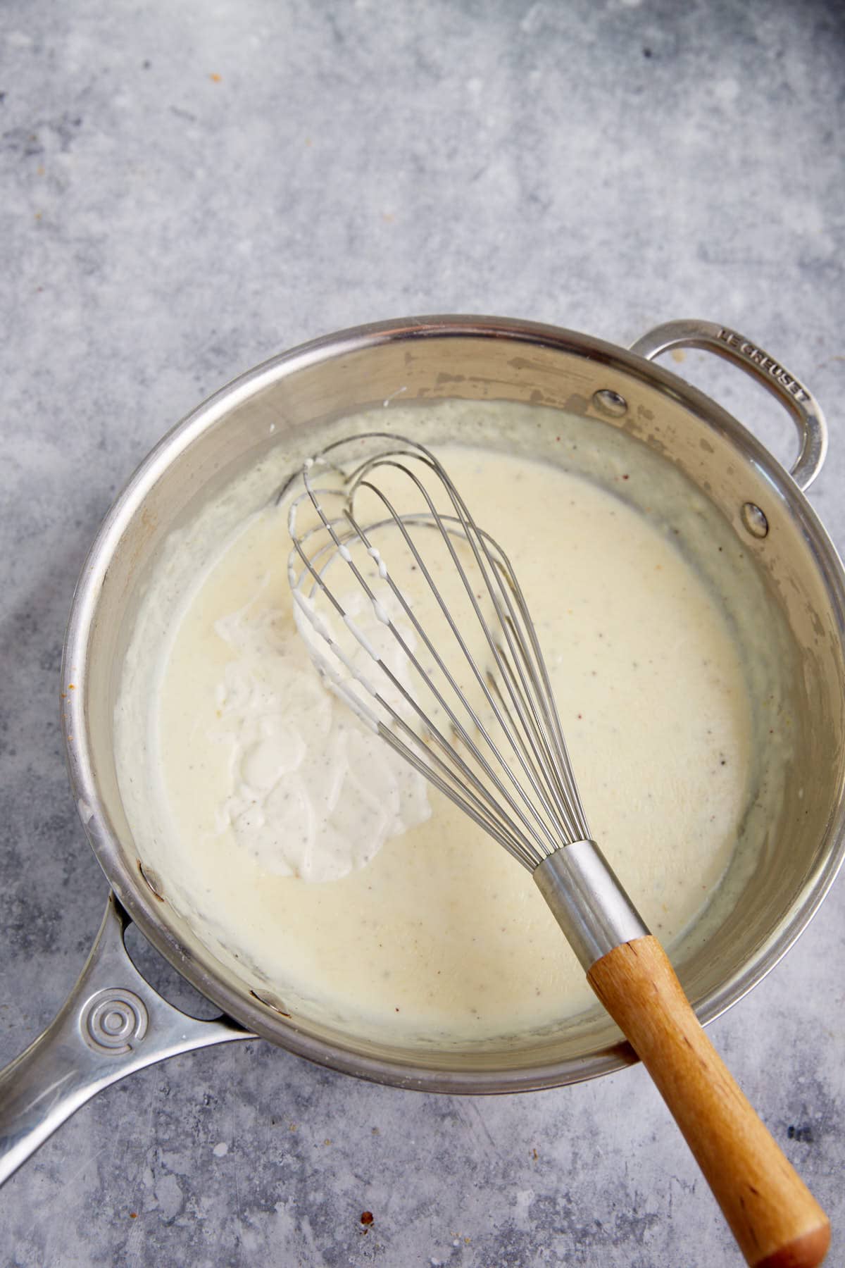 Ranch dressing added to a cheese sauce.