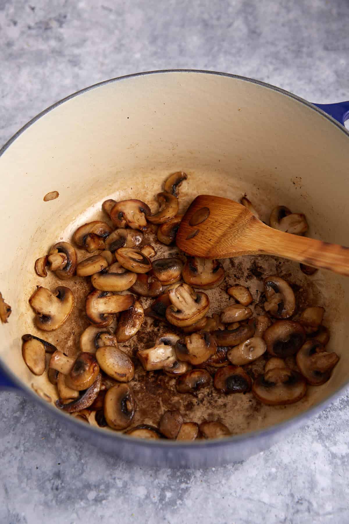 Cooked mushrooms in a Dutch oven.