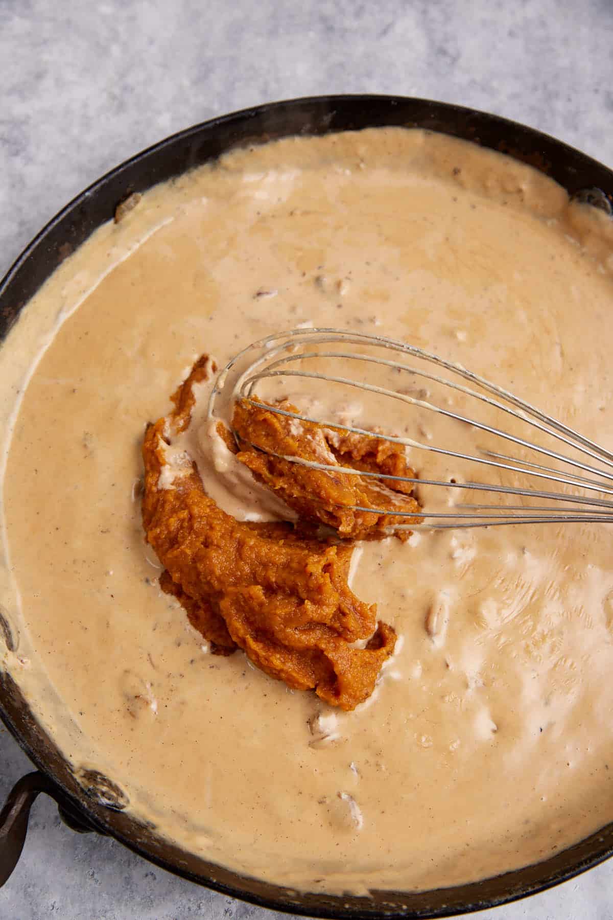 Mashed squash added to the sauce.