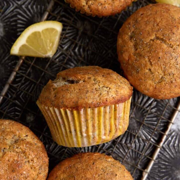 Lemon Poppy Seed Muffins on a wire rack.