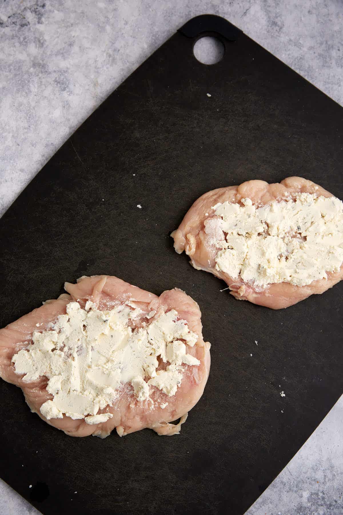 Boursin cheese on top of chicken breasts.