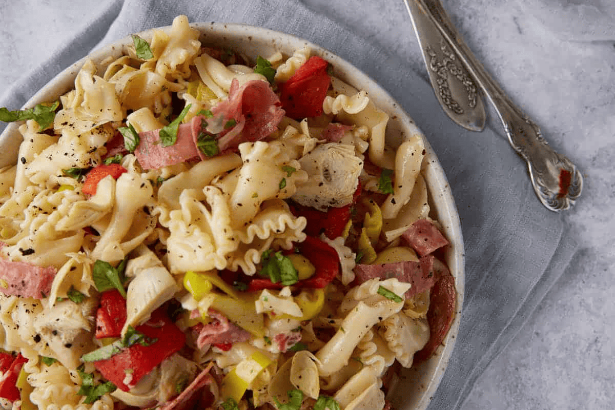 A bowl of antipasto pasta salad.