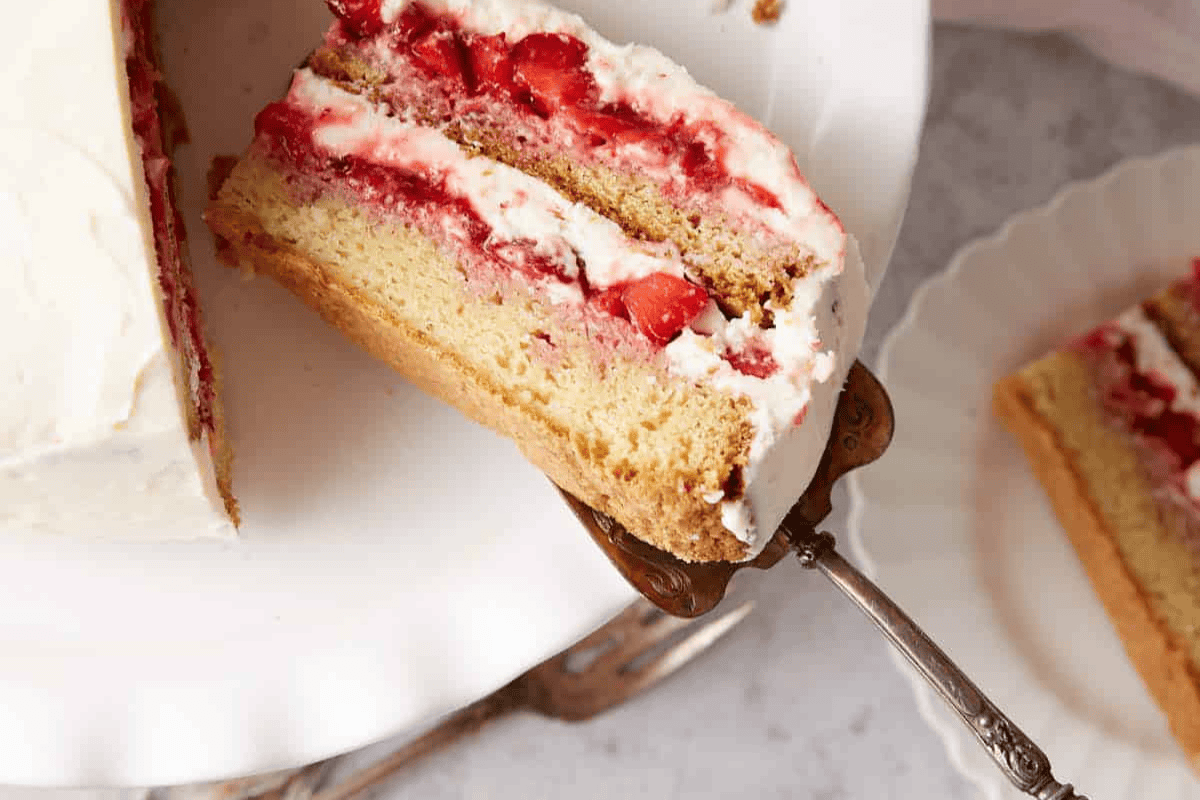 A slice of strawberry shortcake cake.