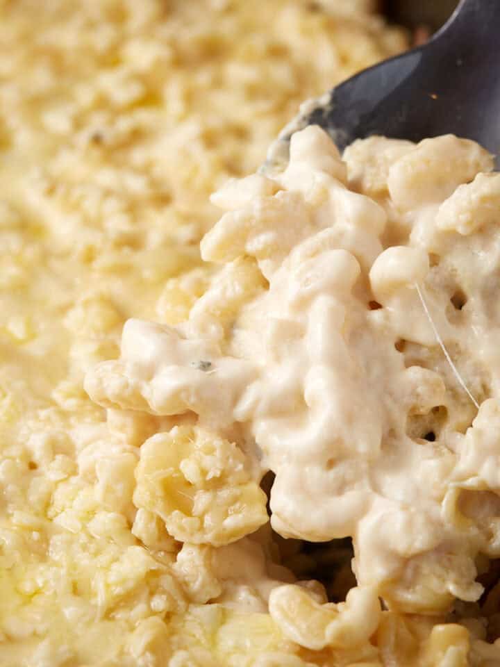 Scooping mac and cheese.