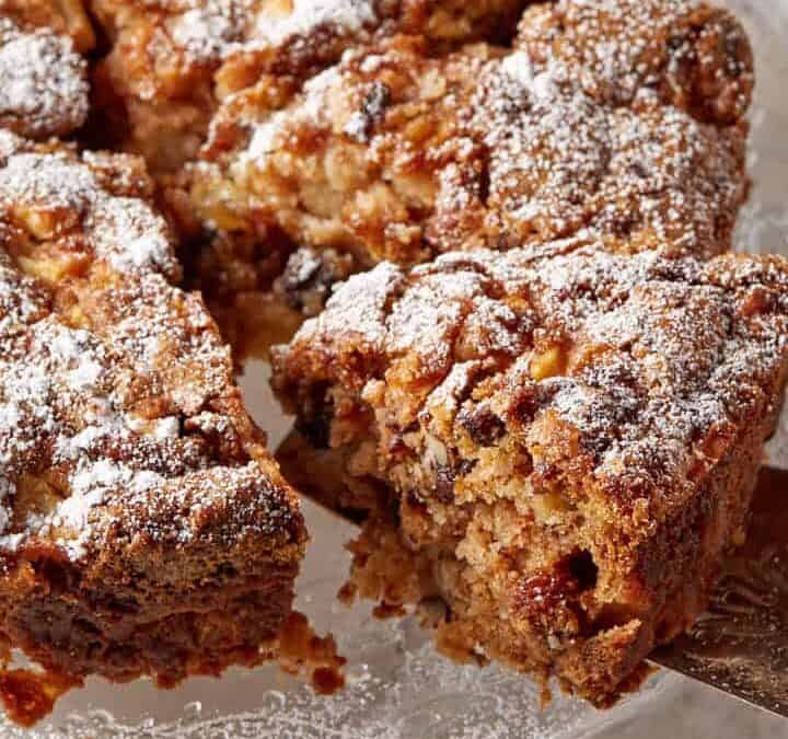 Cinnamon Apple Cake on a glass platter.
