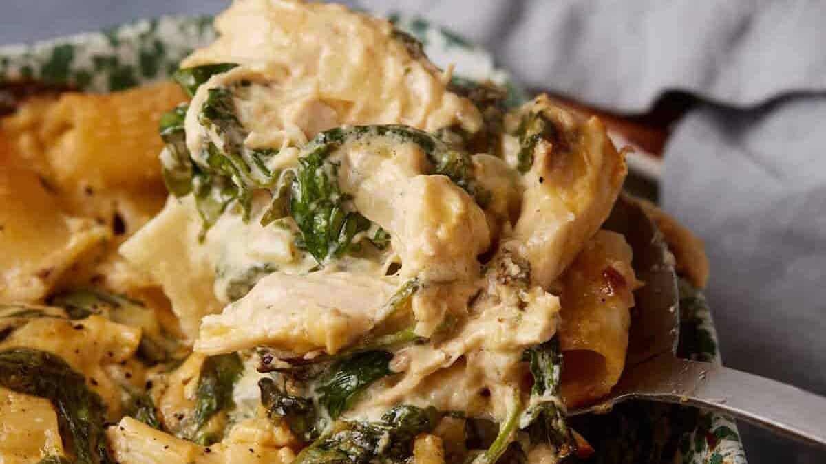 Macaroni baked with chicken, spinach, and melted cheese.