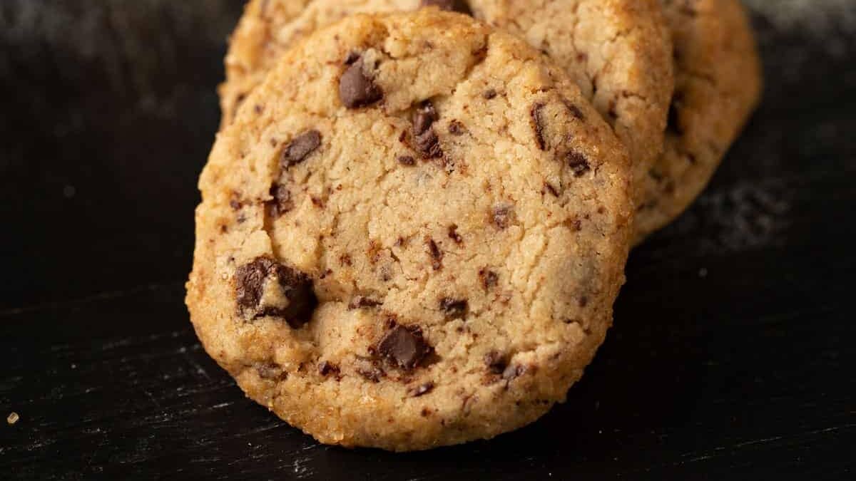 Stacks of cookies with milk.