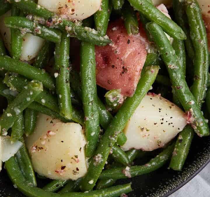 A platter of green bean and potato salad.