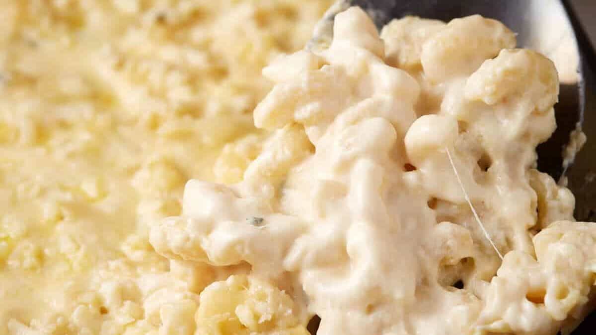 Scooping mac and cheese.