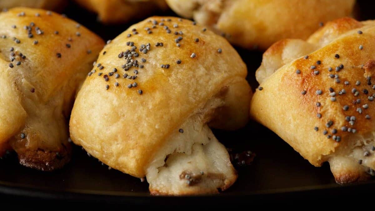 Baked crescent roll appetizers on a platter