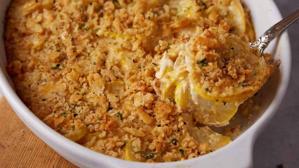 A scoop of a squash casserole.