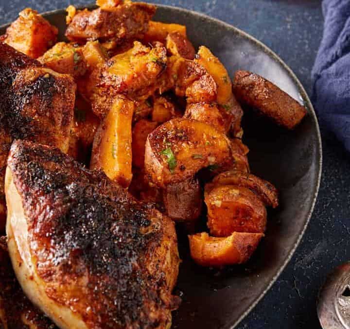A platter of sweet potatoes and chicken.
