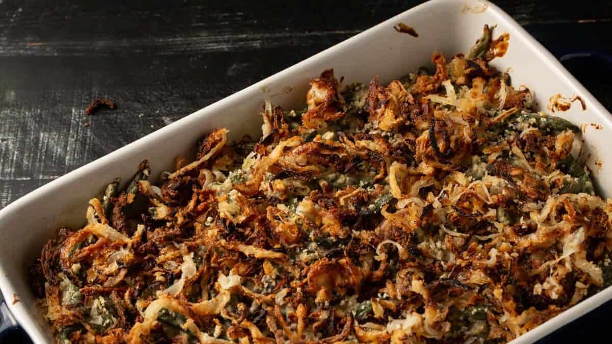 Crispy onions on top of a green bean casserole.