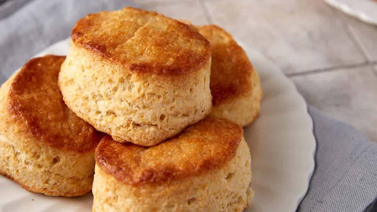 A plate of honey butter biscuits.