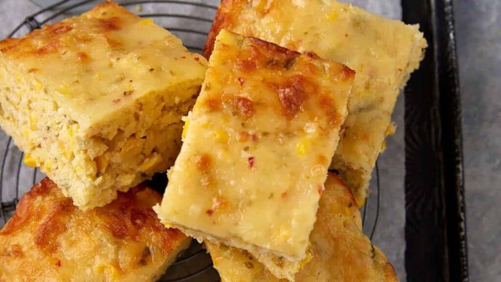 Southern cornbread stacked on a platter.