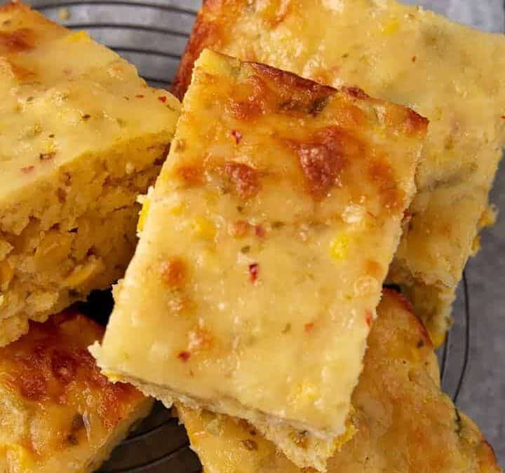 Southern cornbread stacked on a platter.