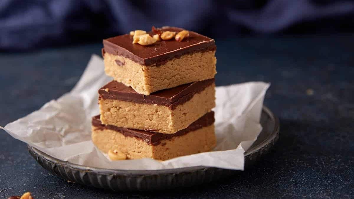 No-bake peanut butter bars with a chocolate topping.